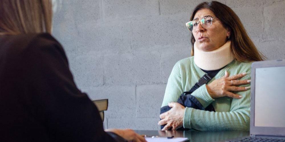 Two women discussing a personal injury case in NYC