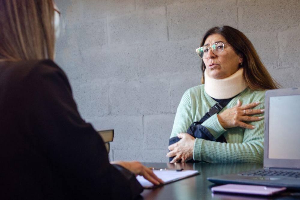 Two women discussing a personal injury case in NYC